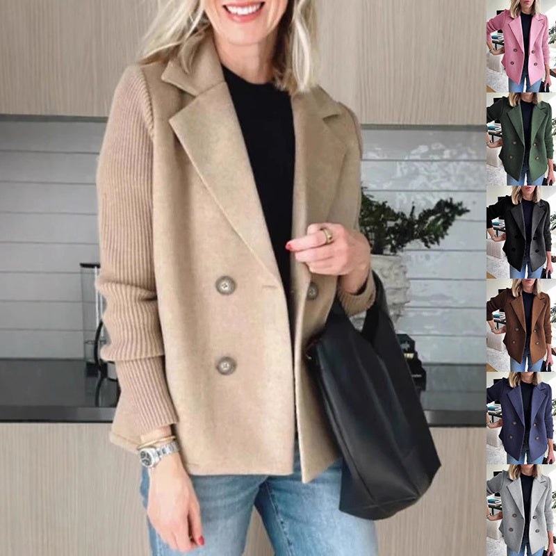 Woman wearing a beige coat with a black bag indoors